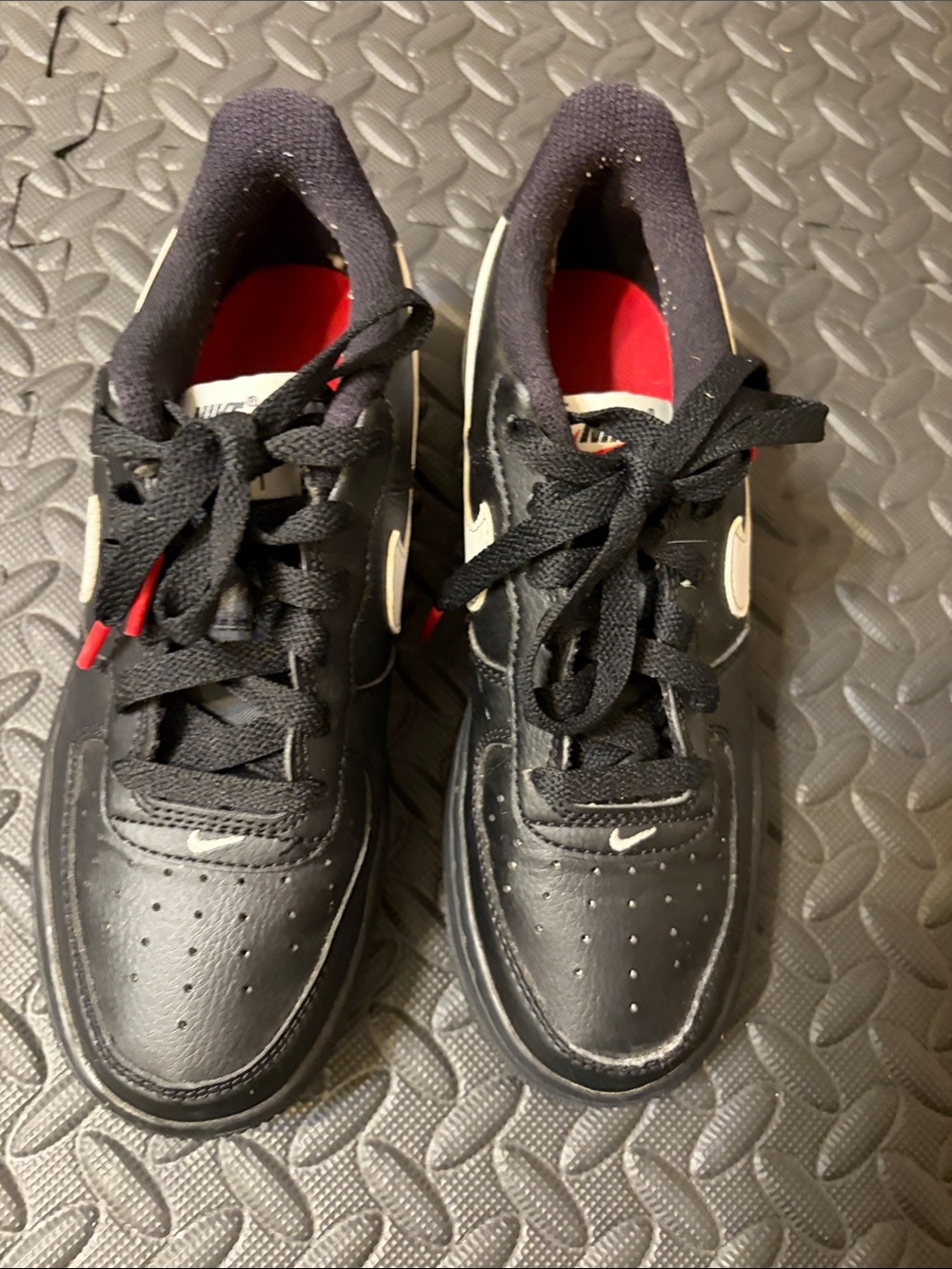Nike Air Force 1  Low Kids Black Sneakers with White Swoosh and Red Interior